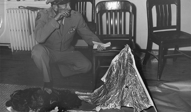 General Ramey with weather balloon pieces